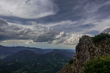 Fototapeta na wymiar viewpoint on a summit to other mountains while hiking