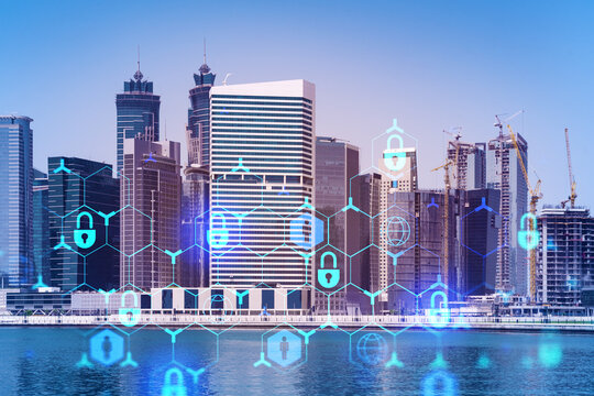 Skyscrapers of Dubai business downtown. International hub of trading and financial services. Lock icon hologram, concept of datum security. Double exposure. Dubai Canal waterfront.