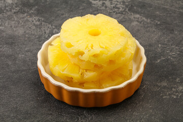 Sweet pineapple rings in the bowl