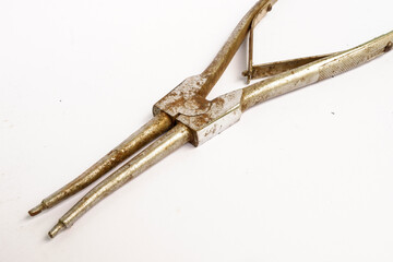 long pliers on a white background