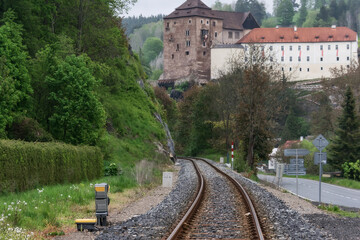 Fototapeta na wymiar railway in the city. the old town of Bečov nad Tepla with its famous fortress on a rock and a castle on a summer day