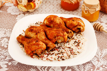 Indian cuisine: roasted chicken with rice and vegetables.