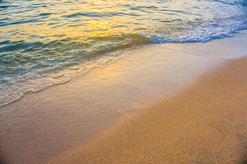 Sea wave beach sunset light