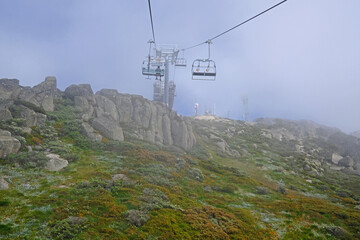Thredbo chairlift in a misty summer morning - NSW Australia