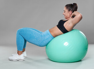 Plus size woman doing fitness exercises