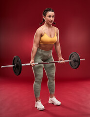 Fototapeta na wymiar Plus size woman doing fitness exercises
