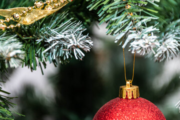 Horizontal Christmas card 2021, 2022. Copy-space for companies and individuals. Greeting card with bokeh background, colours red, green, gold, white, black.