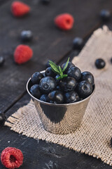 Fresh organic blueberries and raspberries in a basket.Blueberry and raspberry.Healthy eating,diet concept