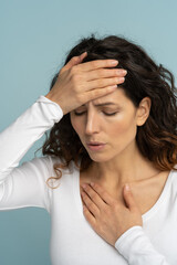 Woman received heatstroke in hot summer weather, touching her forehead. Chest pain, sun stroke,...