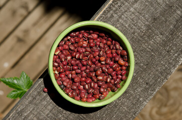 Capture Directly Above Adzuki Beans in Ceramic Bowl on Wood