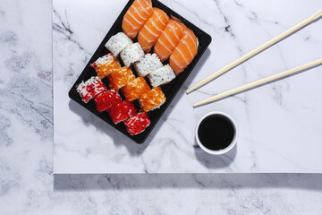 Japanese food concept to go. Sushi take away assortment