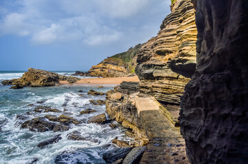 Hole in the wall natural rock formation at Thompsons bay beach ballito