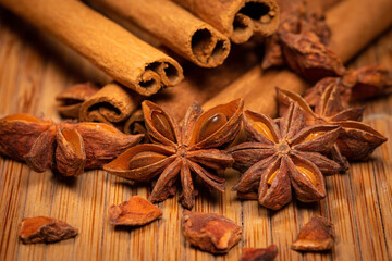 Star Anise with Cinnamon Sticks on Wooden Mat