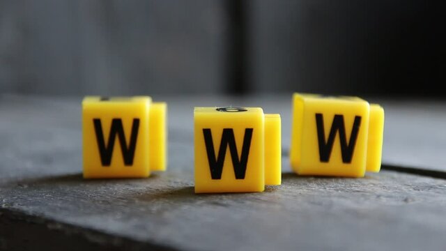 Web and www creative concept. Hand holds a sign with the inscription.