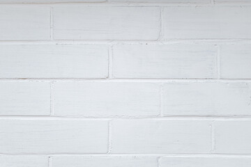 Fototapeta premium A brick wall painted white