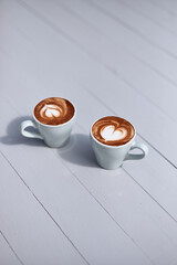 a little cup of piccolo latte