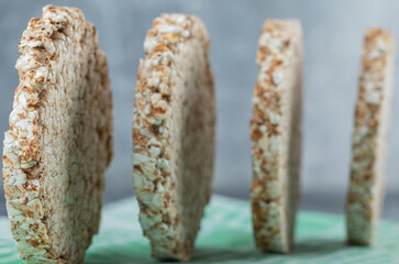 Round tasty crispbread on blurry background