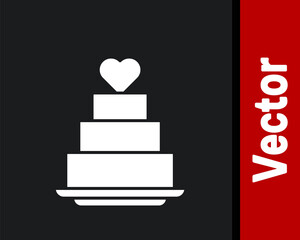 White Wedding cake with heart icon isolated on black background. Vector.