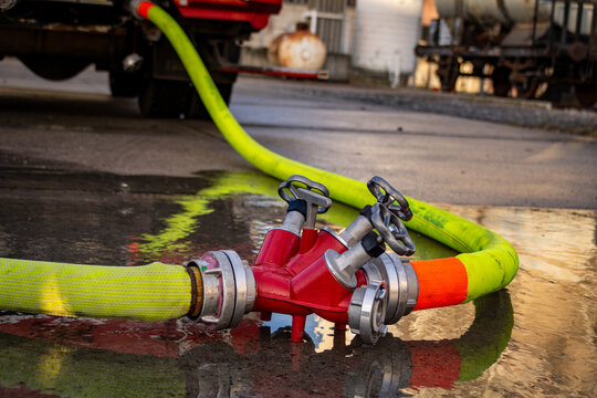 Viene Fire Department Firefighters set up supply lines to a Fire Engine in order to safeguard water pressure at there fire hoses