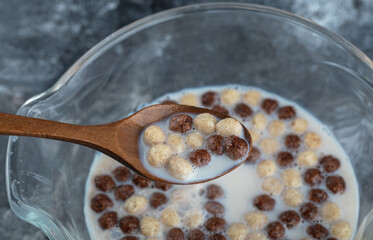 Spoon full of chocolate and wheat balls