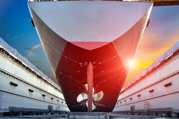 Ship in floating dry dock under maintenance and repairing, Propeller with rudder stern image on...