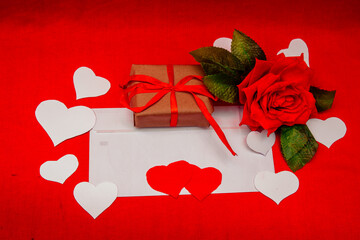 Letter with a rose and a gift