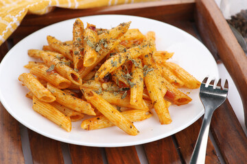 Food - Tasty Penne Pasta Plate with a Fork on Wooden Tray