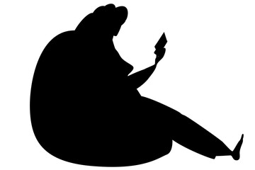 A woman is sitting in a chair and reading a book. Black silhouette isolated on white.