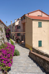 The colourful ancient facades of houses in Imperia old town, Liguria region, Italy