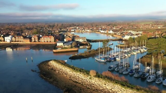 Aerial over Emsworth Yacht Harbour with Hermitage in view in the background.