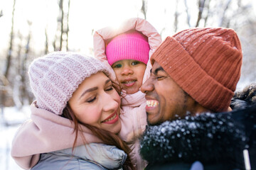 happiness excited people in warm clothing in winter outdoors