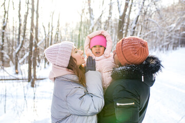 happiness excited people in warm clothing in winter outdoors