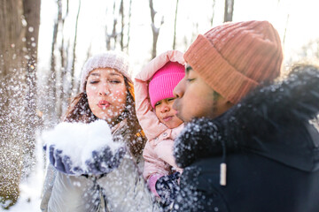 happiness excited people in warm clothing in winter outdoors