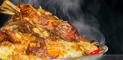 Mandi is a traditional dish from Yemen of meat, rice, and spices. It is now very popular in other areas of the Arabian Peninsula, and it is also common in Egypt and Levant and Turkey.