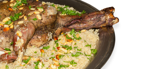 Arabic ouzi (stuffed lamb with rice). A kind of traditional Arabian food. decorated with almonds,...