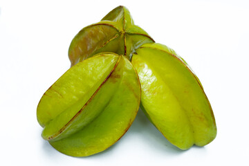 3 green carambola fruit on a white background