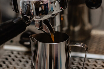 making fresh, aromatic cofee using coffee machine
