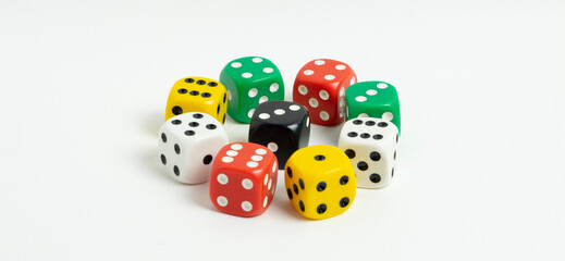 Mixed color standard size dice isolated on white background in circle