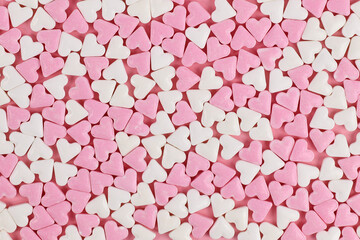 Pink and white heart shaped sugar desser sprinkles