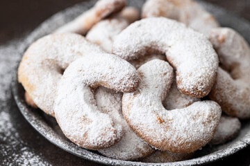 Fototapeta na wymiar Home baked German Austrian traditional Christmas cookies vanilla crescents