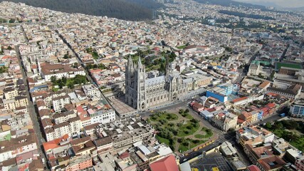 Fototapeta na wymiar Aerial view of the Basilica of the National Vow, Panecillo and Colonial Quito