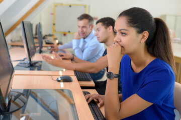 Fototapeta premium cheerful student using a laptop