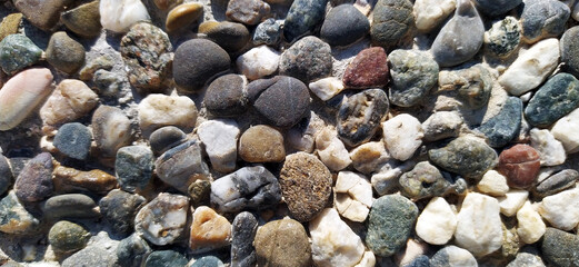 Pebble stones texture in close-up. background.