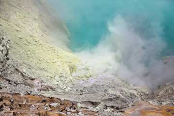 Volcano Ijen. View from above, stunning view of the Ijen volcano with the turquoise-coloured acidic...