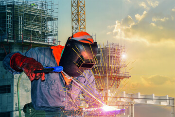 Male worker welding wearing protective clothing of repair pipe argon welding industrial...