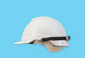 White safety helmet isolated on blue background with clipping path.