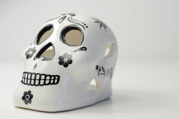 Ceramic skull Calavera from the Mexican Day of the Dead  with traditional ornaments