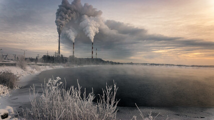 Reftinskaya GRES power station with Reftinsky reservoir in winter, Russia, Ural, January
