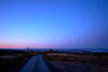 road on the toten&aring;sen hills in evening