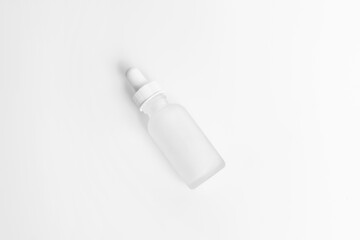 Hyaluronic acid bottle on a light background.